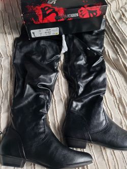 Black high knee boots