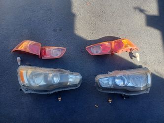 09 Mitsubishi Lanser Headlights, Taillights, Side Signals