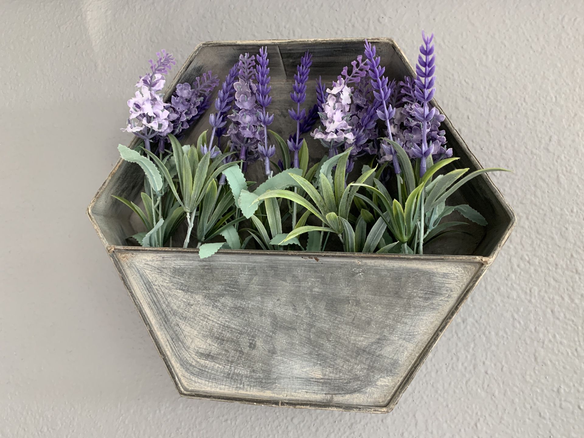 Metal Vase holding “lavender flowers” - wall decor