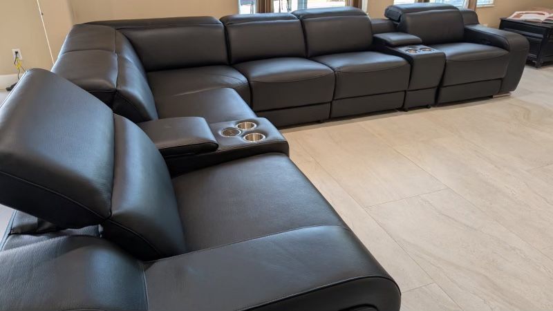 New 8 Piece 3 PWR Reclining Sectional. Genuine Italian Leather. 123” X 151” X 35”H. Free Delivery!