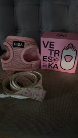 Small dog harness with leash and poop baggies