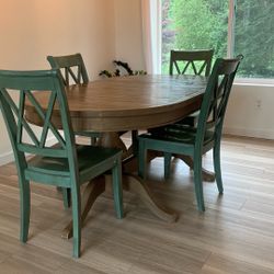 Oval table with 2 leaves extends to 98”