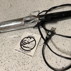 Conair Instant Heat Curling Iron with a 1 1/2 inch barrel and high/low heat settings