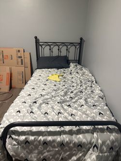 Twin bed frame + mattress + bedding