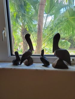 Wooden pelicans