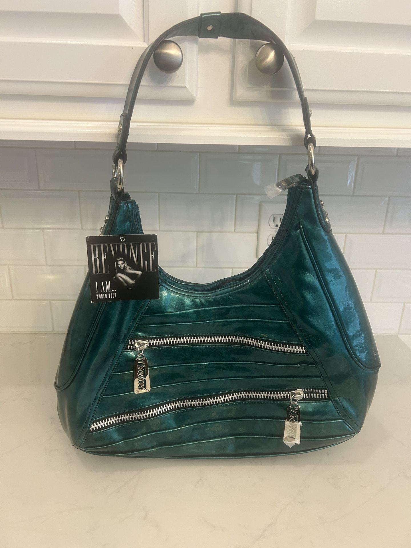 Beyoncé Faux Patten leather hobo purse