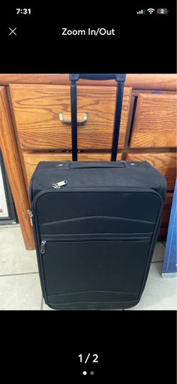 Medium size suitcase black 25.00