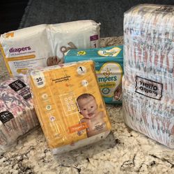 Size 1 and NB Diaper Bundle