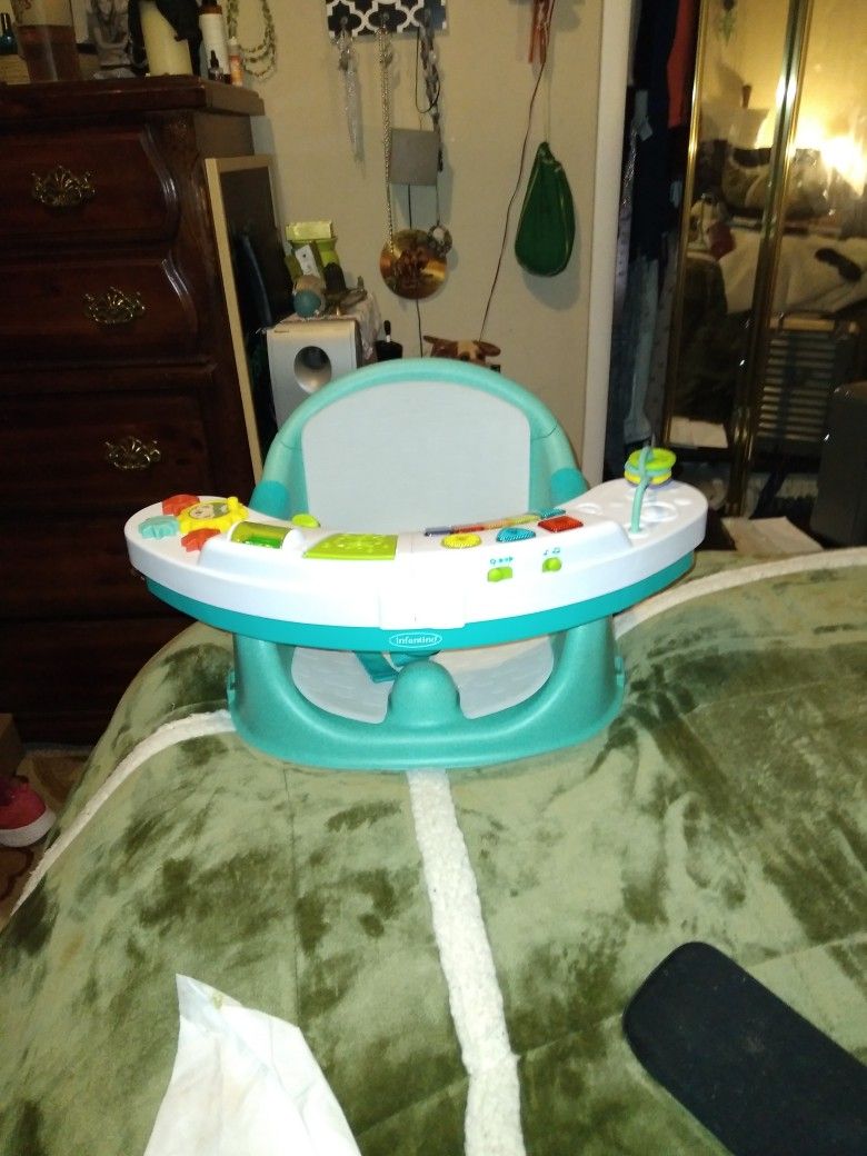 Infantino Booster Chair