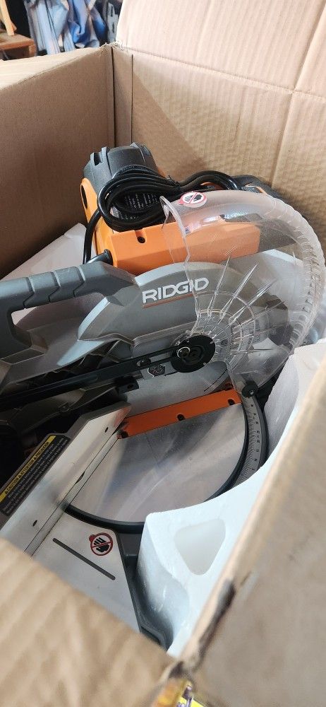 brand new rigid 10in dual bevel miter saw 