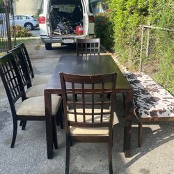 Dining set 7 pieces everything included size L70.5” W33.5” H30” great condition clean six chairs bench and table it