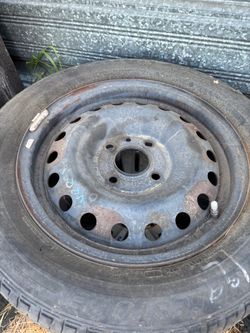 One steel rim 2012 Nisan Versa
