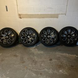 22 inch rims tires pay four grand for one 1500