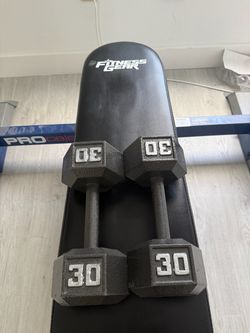 Selling two 30 lb dunbell weights