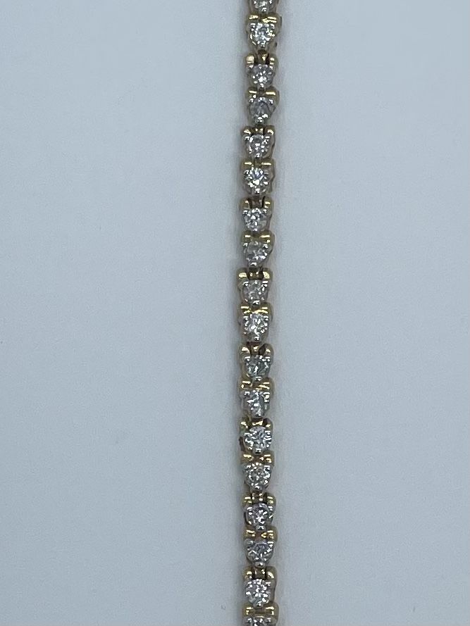 14K Gold . Dia Bracelet