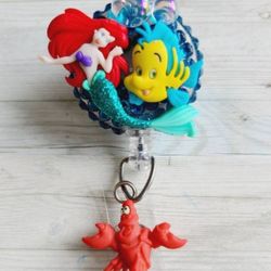 Ariel, Flounder and Sebastián ID holder