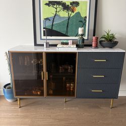 Navy and gold buffet cabinet