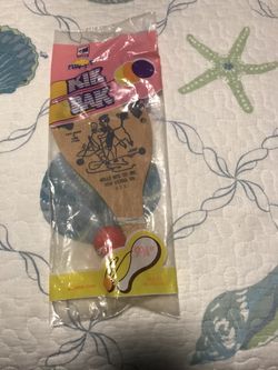 Vintage paddle toy, Kik Bak