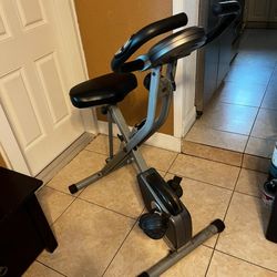 Exerpeutic Foldable Exercise Bike… Stationary Bicycle With Airsoft Seat… In Working Condition… $75