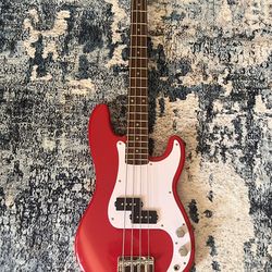 Squier red mini electric bass guitar