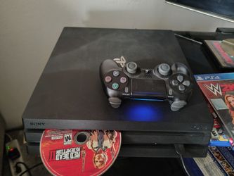 PS4 + 8 Games