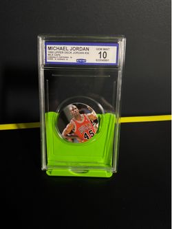 1995 Upper Deck Michael Jordan Milk Cap (Pog) #36. It is featuring Jordan wearing his famous comeback number 45 jersey.   The grading company is CCG (