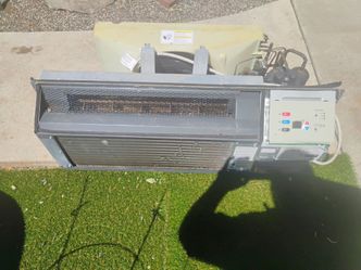 220 a/c n heater wall unit, new not ysed