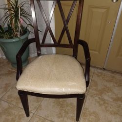 Two Arm Chairs .