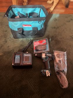 Makita Drill, Charger And Battery