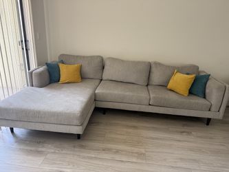 Gray sectional sofa with chaise