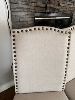 4 Cream colored chairs