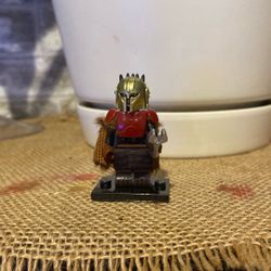 The Armorer is a skilled Mandalorian blacksmith Logo Figure