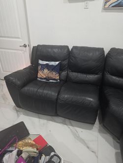 Black leather sofa and recliner