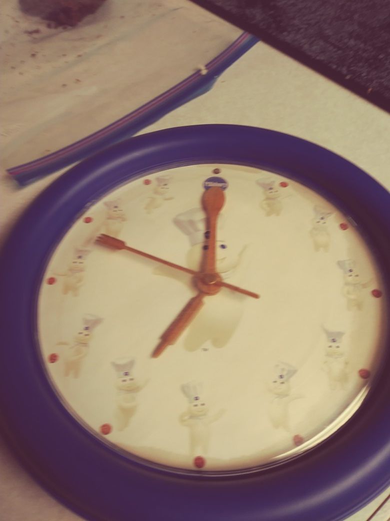 Pillsbury Doughboy clock, pie pan decor and timer