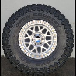 17" KMC w/ 35" Toyo MT tires 