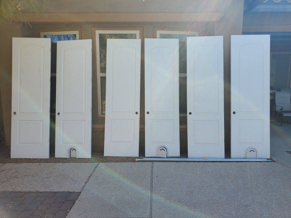 4 Doors With Cat Doors And 2 Regular Doors 