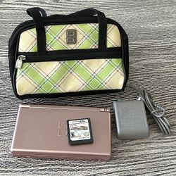 Nintendo DS in excellent condition with Mario Kart game, complete with stylus & charger. $70