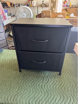 Small dresser with cloth drawers $15brand new 15 for one or 25 or two