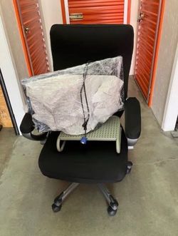 Office chair, 24” monitor and riser