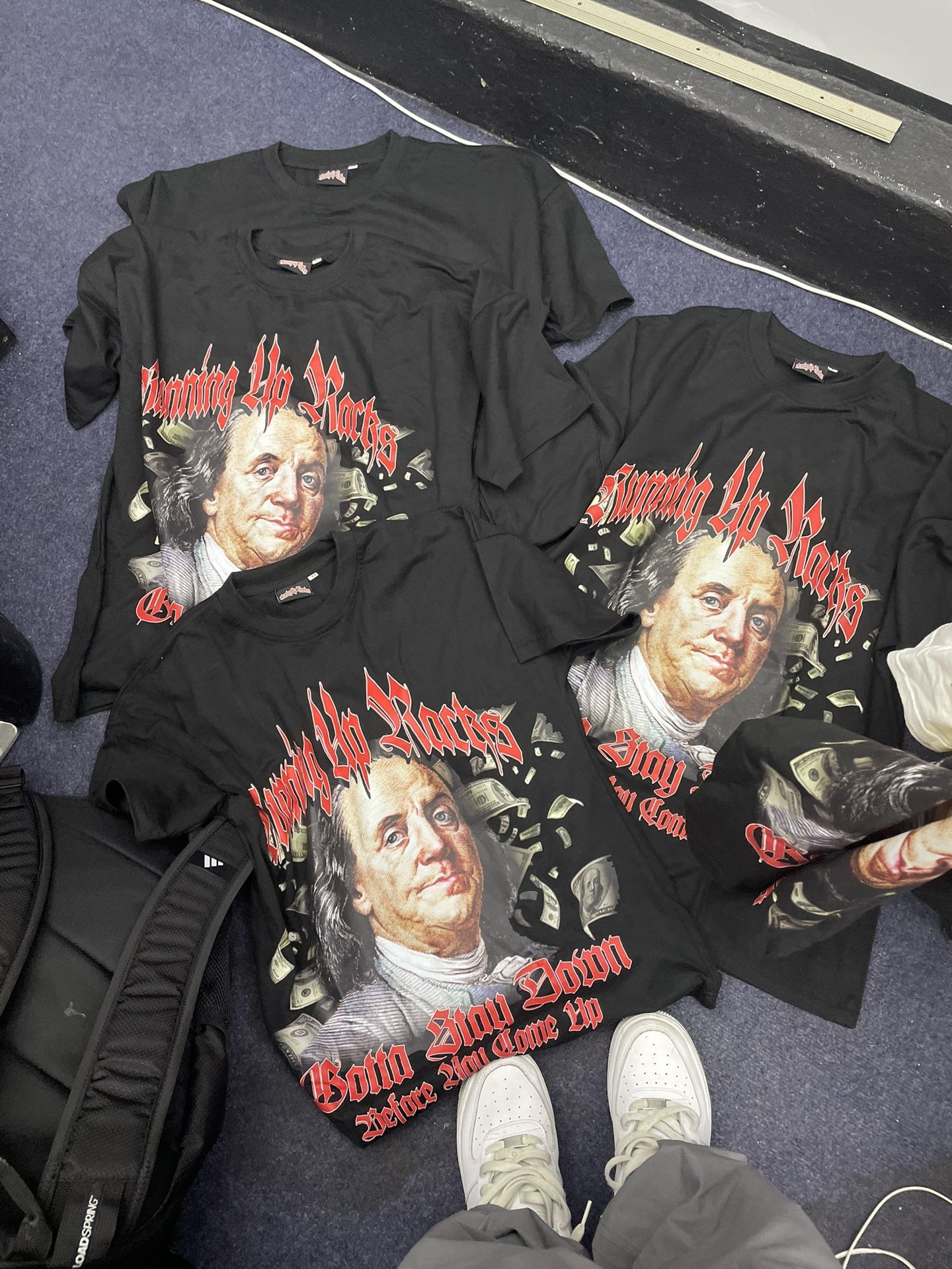 “RUNNING UP RACKS” Benjamin Franklin Tees