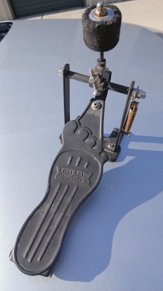 First Act Discovery bass drum pedal, typically included with a junior drum set.