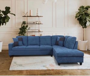 Blue microfiber sectional couch and ottoman