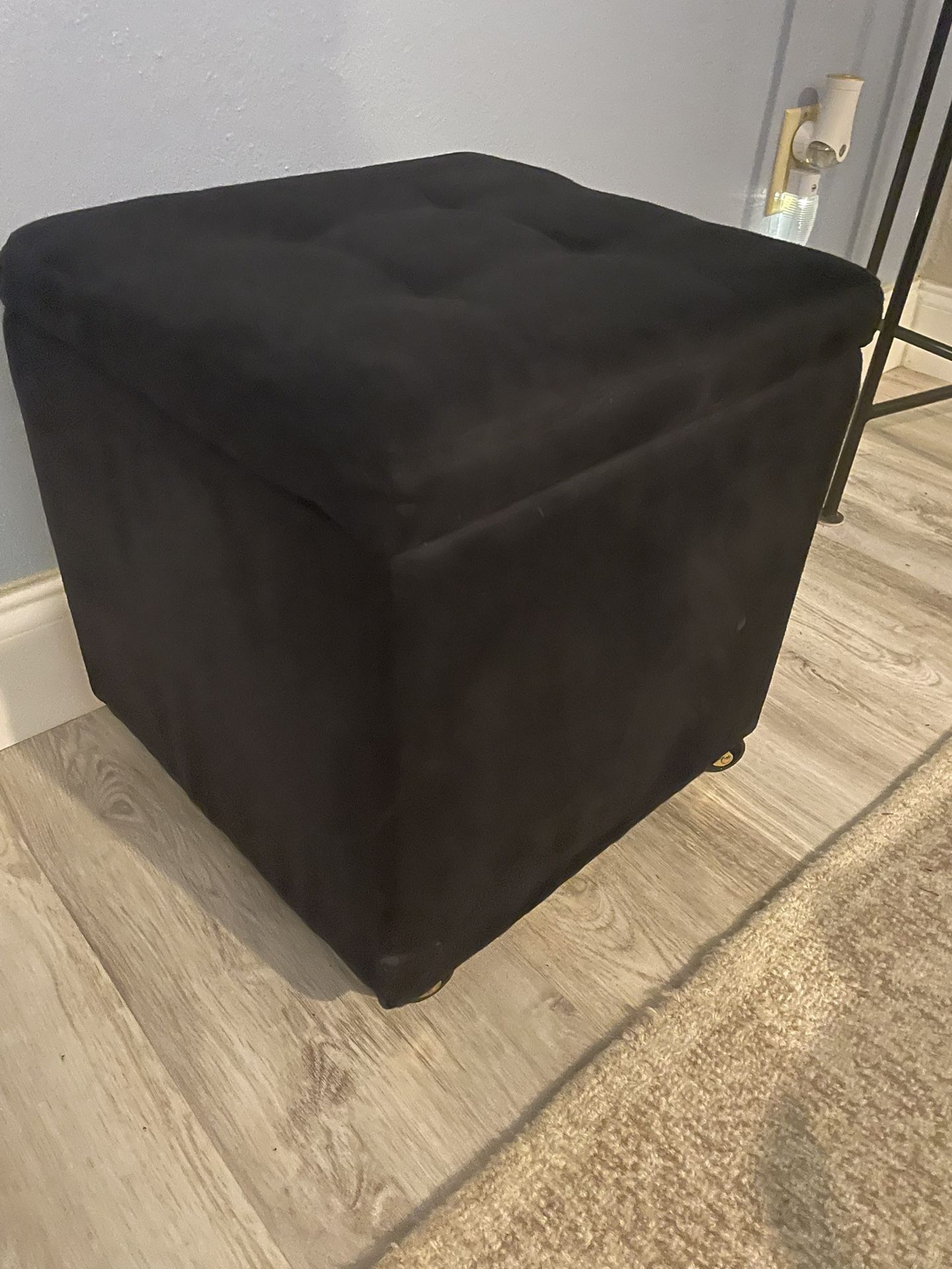 Black Rolling Ottoman 
