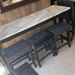 Brand new table and three stools for $450