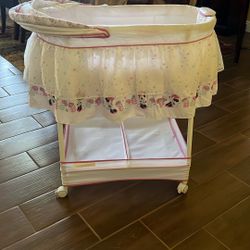 Delta Children Gliding Bedside Bassinet