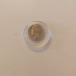 BUSCO** COLECCIONISTAS**PARA ESTA MONEDA CON CARA POR AMBOS LADOS DE TOMAS JEFFERSON DE  1964