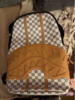 Spray ground backpack