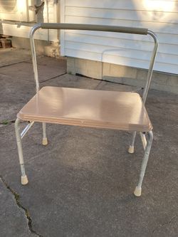 Bath Chair:  Adjustable height, Metal, New Never used 