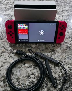 Nintendo Switch Oled with 3 Games