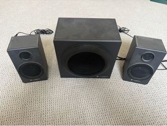 Logitech z333 multimedia speaker with subwoofer and 2 speaker system.
